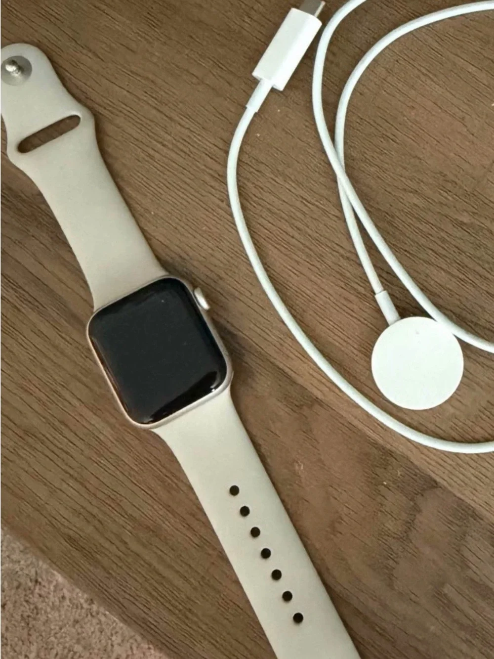 Smartwatch with Cream Silicone Band and Magnetic Charger